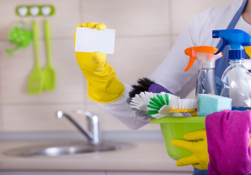 Cleaning team following safe working practices during a routine service