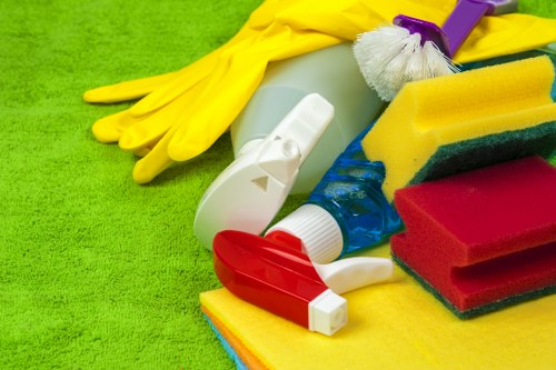 Office cleaners in Crystal Palace vacuuming and dusting a commercial space